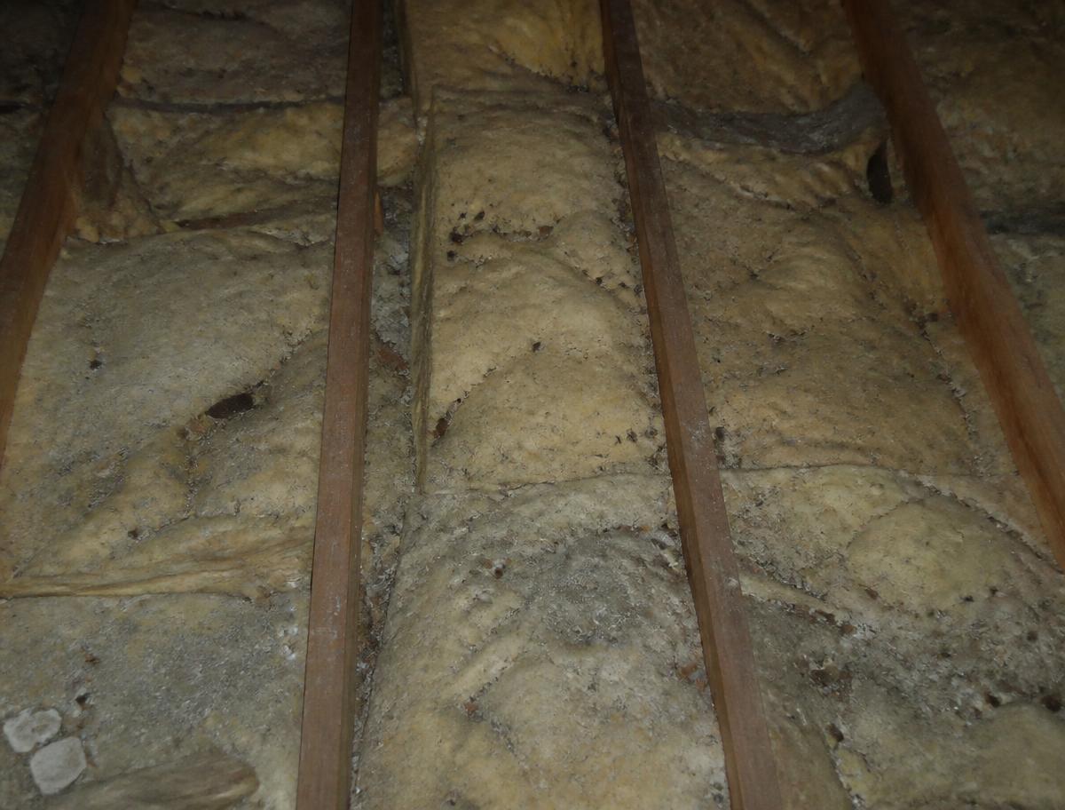 Before: 40-year-old contaminated batts